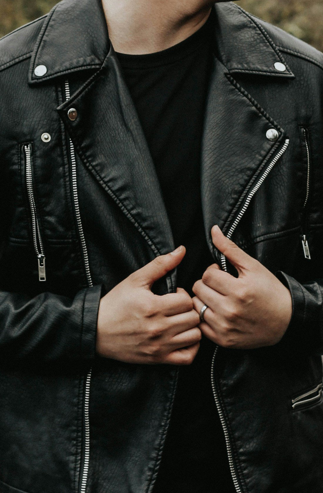 Fashion editorial: a person wearing a black leather jacket