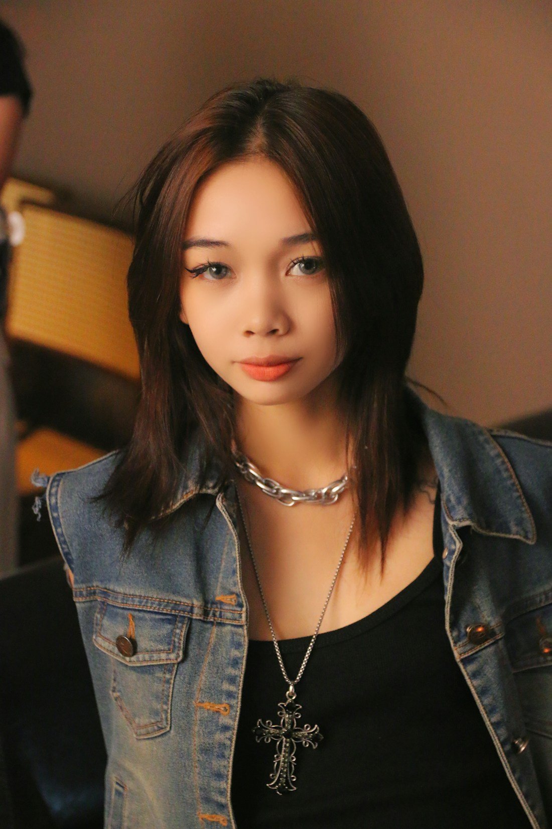 Fashion editorial: a person wearing a denim jacket
